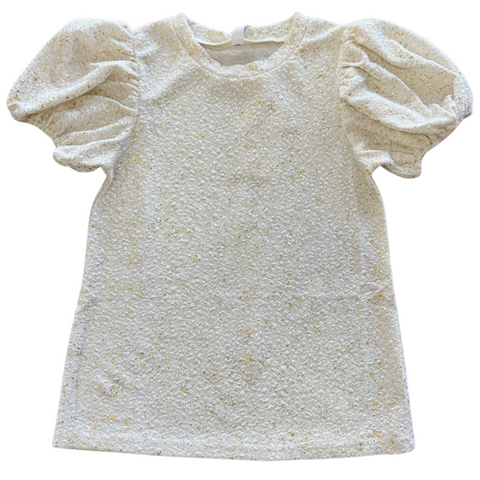 ivory colored shirt with gold flakes and puffed sleeves