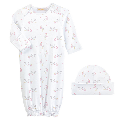 White baby gown and hat set featuring a pink stork print, long sleeves, and an elastic hem, made from soft cotton for newborn comfort.
