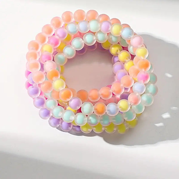 Set of fun and bright beaded pastel bracelets