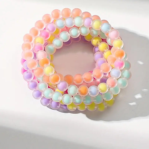 Set of fun and bright beaded pastel bracelets