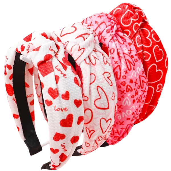 Set of heart-patterned headbands on a white background