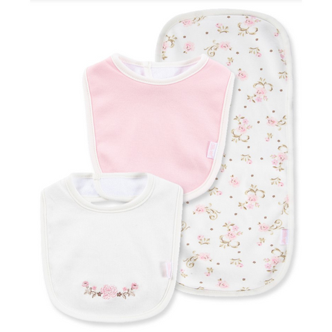 Three-piece baby gift set featuring two bibs—one pink, one white with embroidered flowers—and a floral-patterned burp cloth in soft pastel tones.