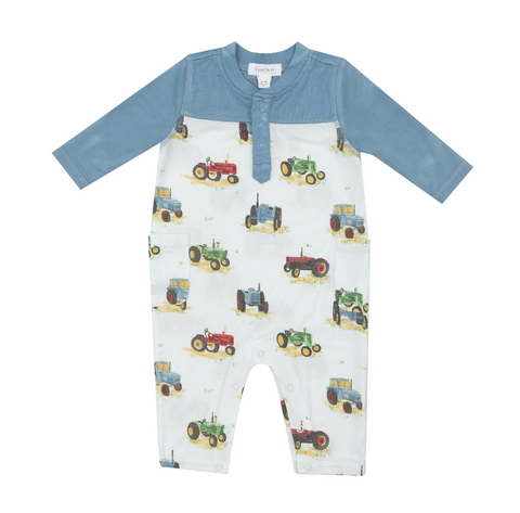 blue daywear romper with different colored tractors