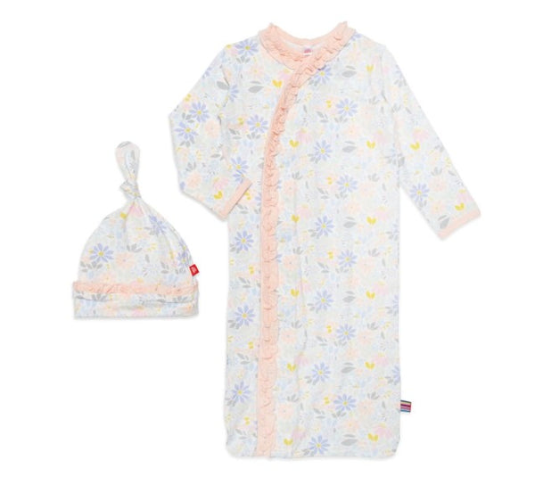 closed bottom baby gown with ruffled magnetic front closure in a sweet floral daisy like print with a matching knot hat.