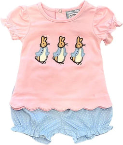 Pink shirt with ruffled sleeves and three applique bunnies on the front. also with blue shorts with ruffles at the bottom with small white polka dots