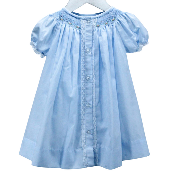 traditional style day dress for girl in baby blue. Lace touches at the button placket and sleeve with bullion roses smocked at the neckline
