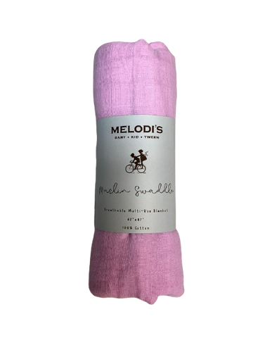 carnation pink muslin swaddling blanket